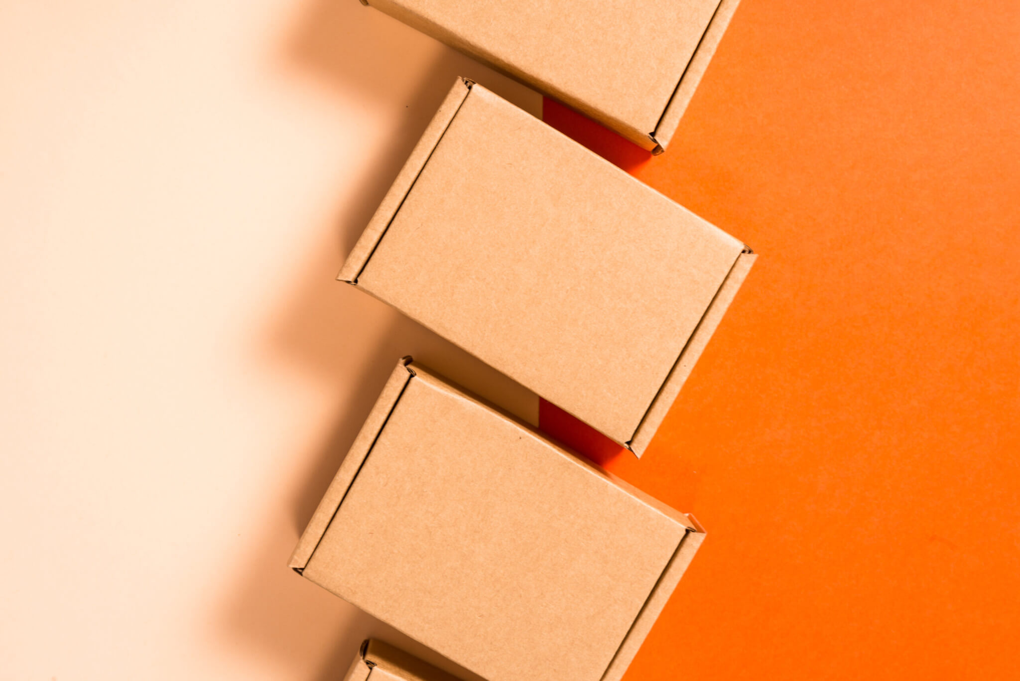 Set of brown cardboard boxes on colorful background
